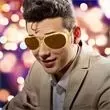 Golden Elvis style sunglasses.