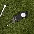 Divot repair tool with