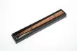 Wooden brown chopsticks in